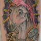 Illustration for article titled 55 Bad Unicorn Tattoos